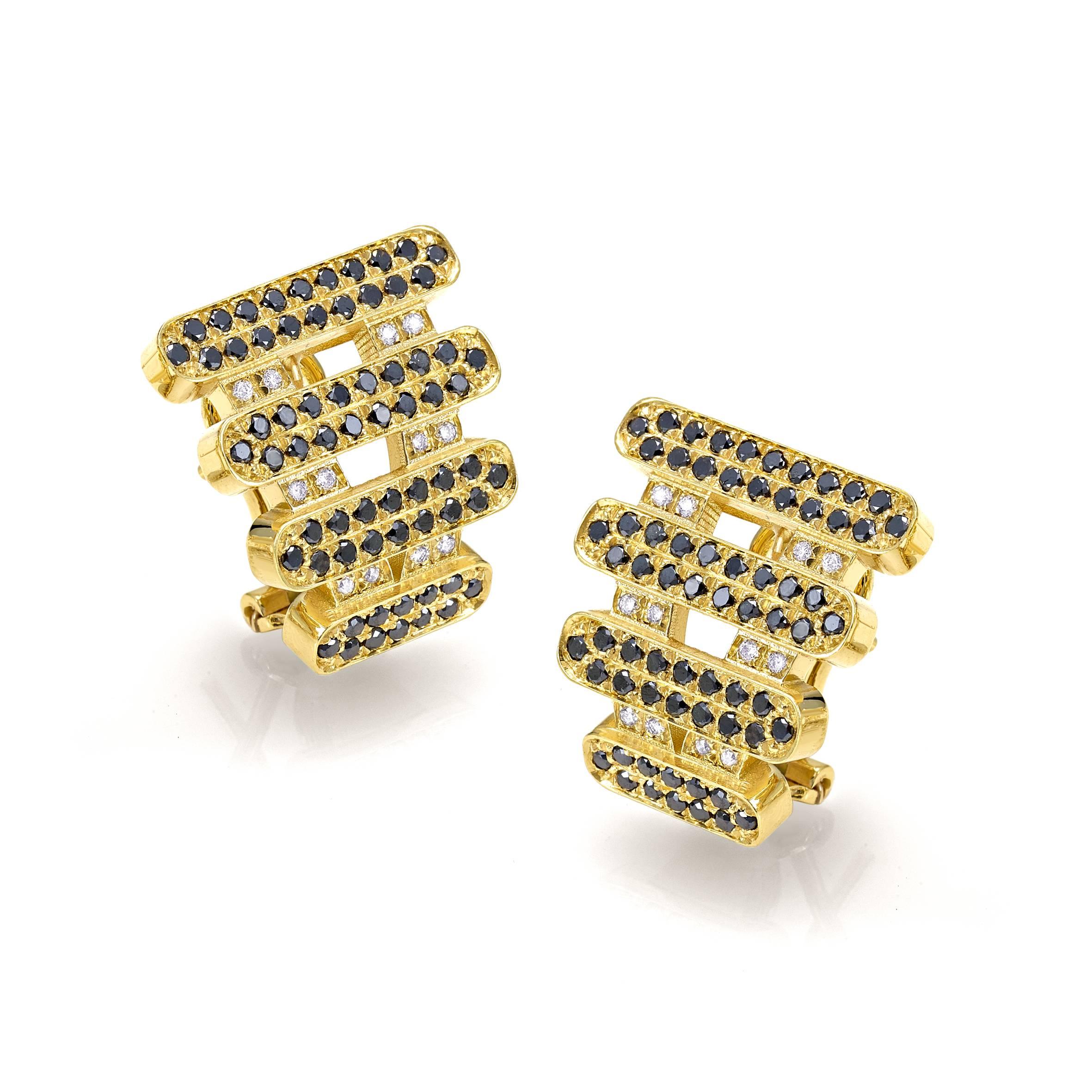 Moonlight earrings in 18 kt  yellow gold white and black diamonds 
These pieces are just unique in our production story

the total weight of the gold is  gr 16.40
the total weight of the white diamonds is ct 0.18 - color GH clarity VVS1
the total