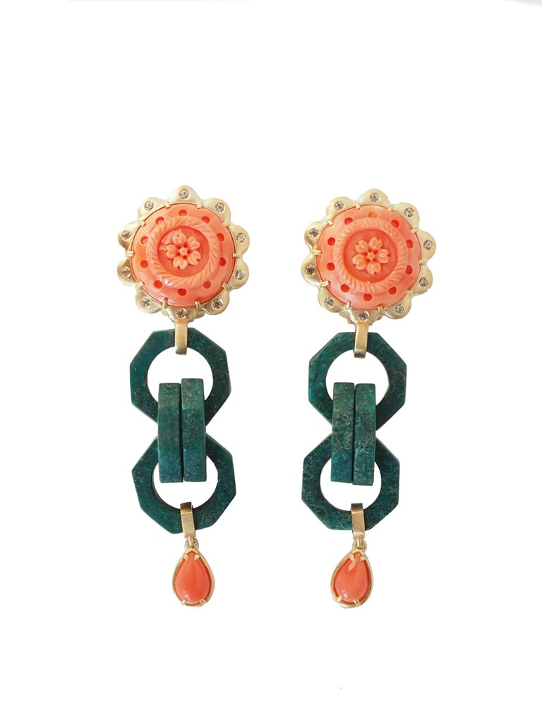 Unique pair of earrings with carved coral, antiques walrus Ivory  very rare pieces used in China during Quing Dynasty when jade could be ware only from emperor family, green sapphire.
18 k Gold gr. 17,40, length 6,5cm weight 15,5gr each.
All Giulia