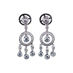 Boucles d'oreilles lustre en or blanc 18 carats et diamants