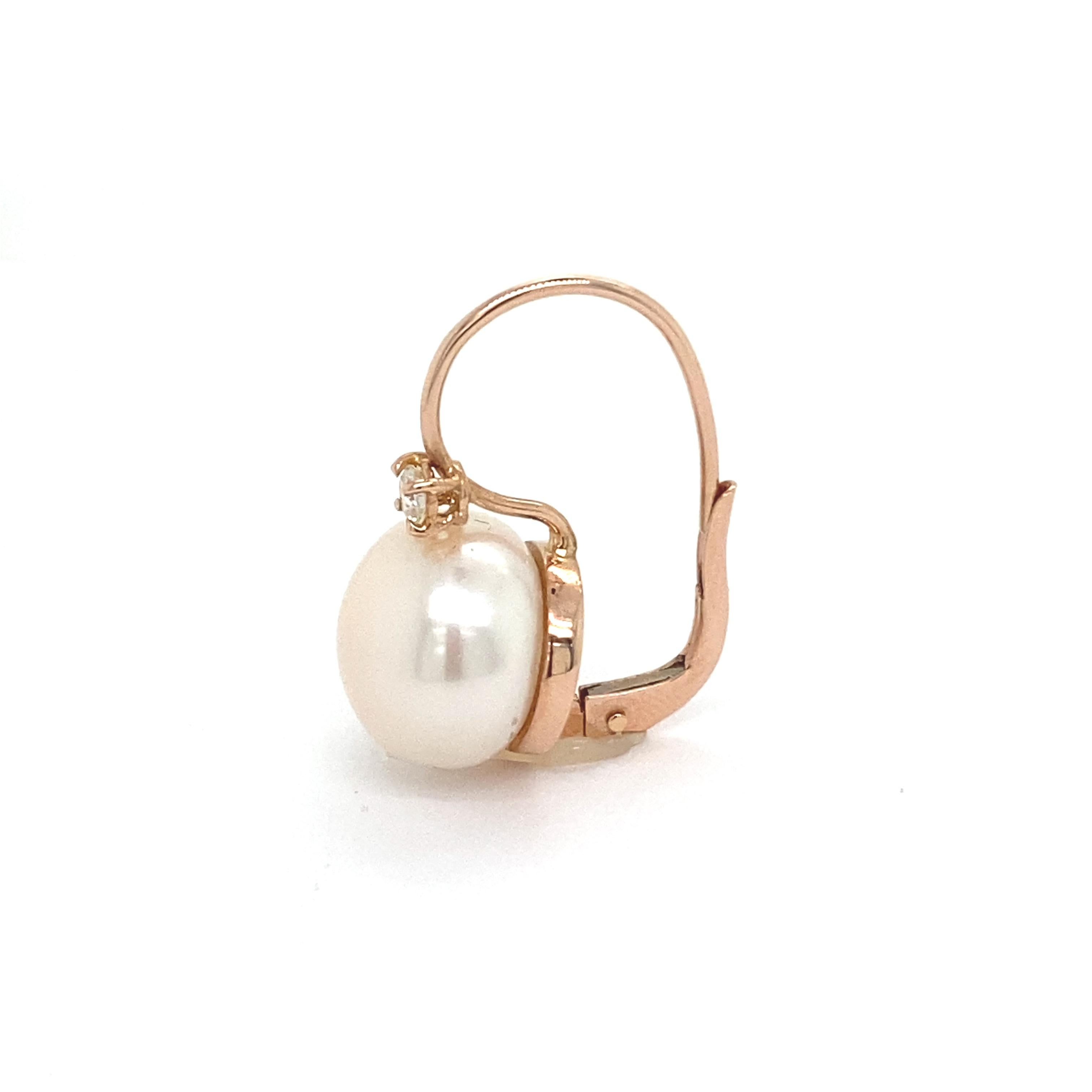 Earrings Diamonds and Cultured Pearl Pink Gold 18 Carats 

Discover these magnificent earrings in 18-carat pink gold, accompanied by 0.14-carat diamonds and a pearl, a creation of Mesure et Art du Temps. These earrings are both elegant and timeless,