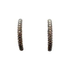 Pendientes con 2 diamantes de chocolate engastados en oro de fresa de 14 quilates