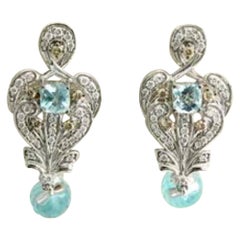 Earrings featuring Topaz Vanilla
Chocolate Diamonds set in 14K Vanilla Gold Earrings featuring Topaz Vanilla
Chocolate Diamonds set in 14K Vanilla Gold