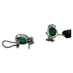 Earrings in 18 Kt White Gold, Emeralds and Pear Cut Diamonds