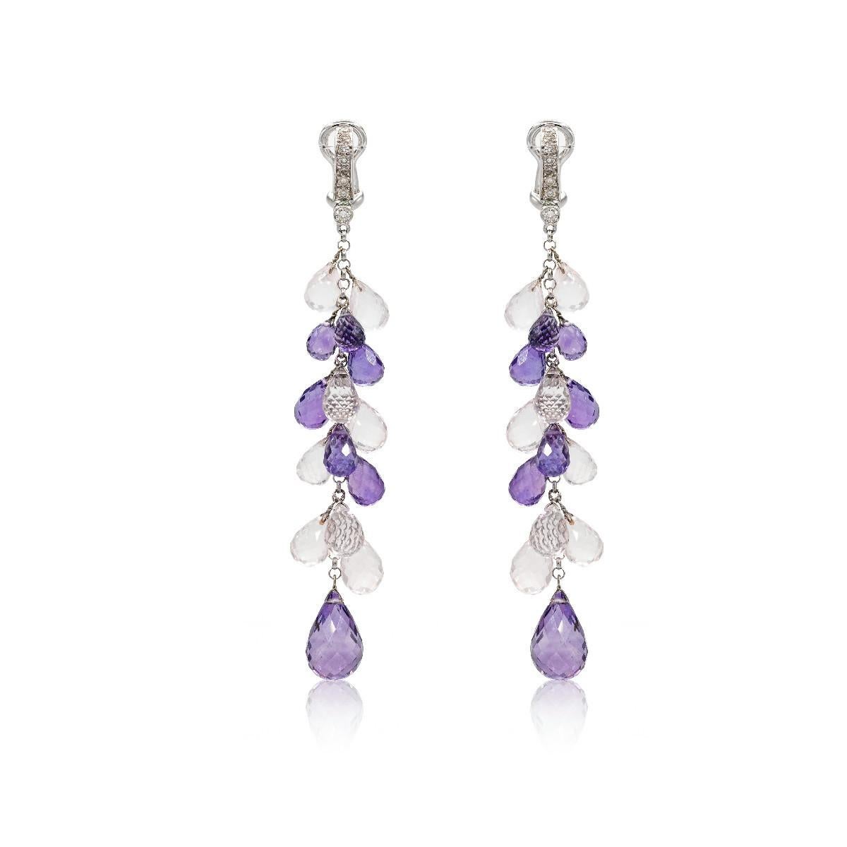 Boucles d'oreilles en or blanc 18 carats, diamants et améthyste  

Boucles d'oreilles en or blanc 18 carats d'un poids total de 5,03 grammes, 14 diamants d'un poids total de 0,18 carats et améthyste et topaze d'un poids total de 29,92 carats.

