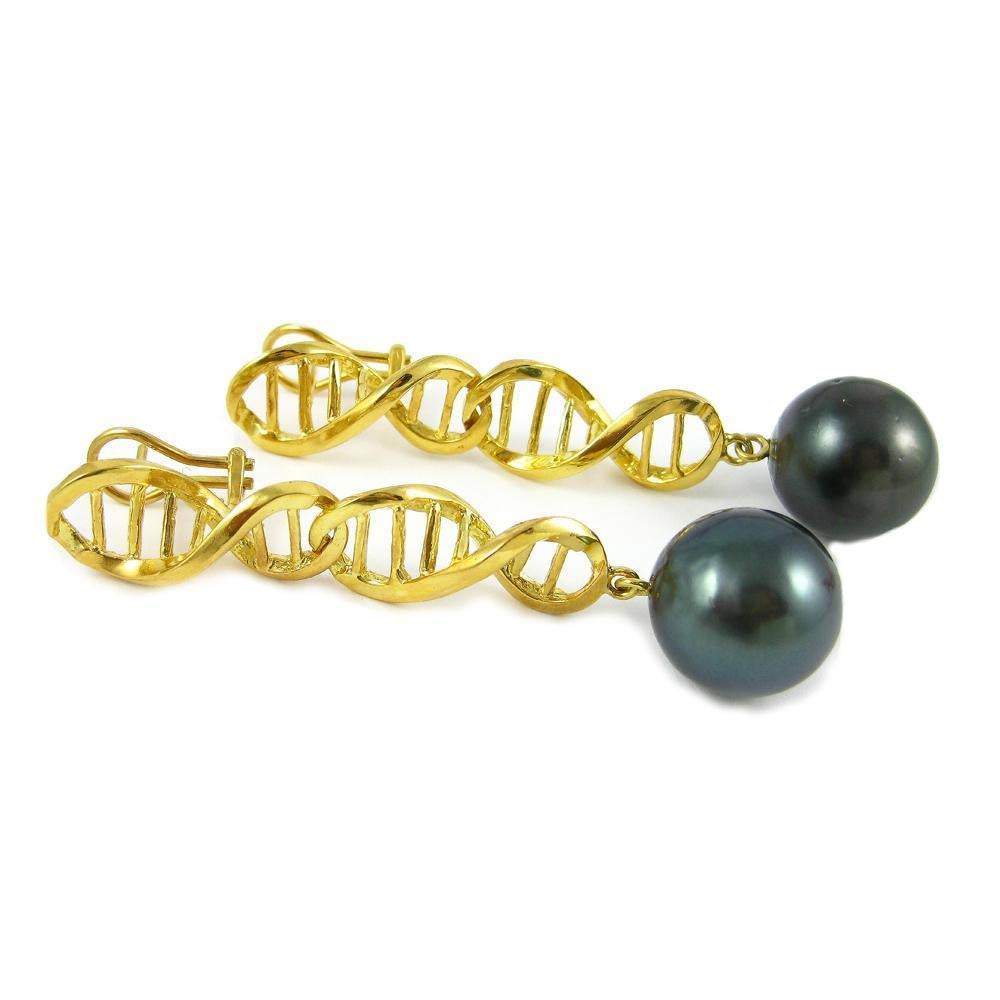 Science, Nature, Man, Mother…all connected by poetry, laced through their shapes.

This is the essence of The DNA Collection. These DNA earrings in 18k yellow gold with Tahitian pearl drops embody man and nature intertwined in the genetic structure