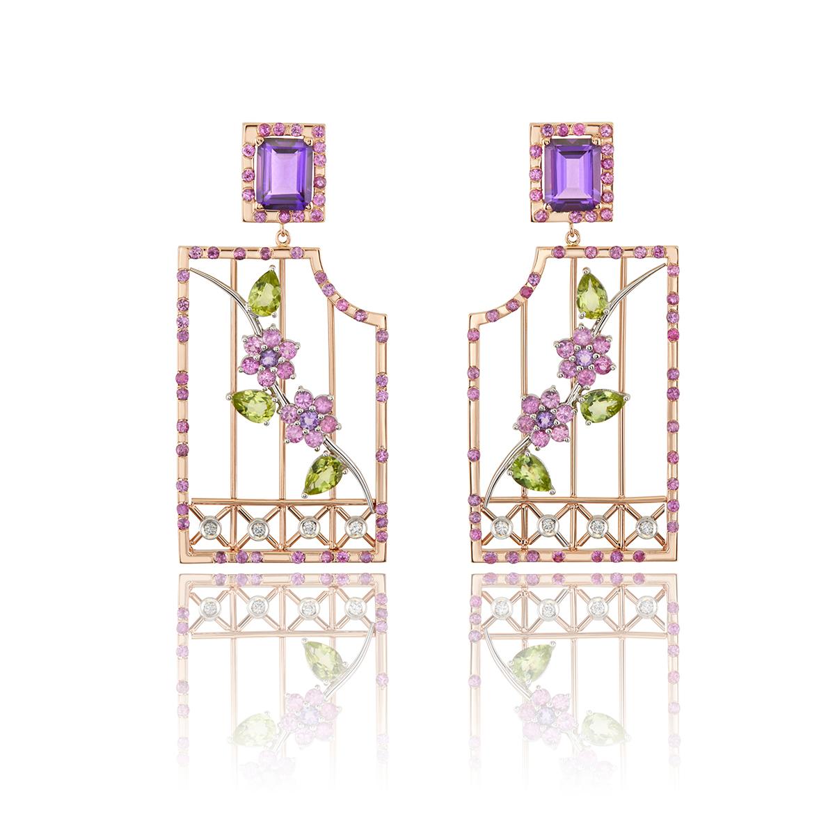 Earrings,  18Kt  yellow gold  with mixed stones such as  Amethyst, Rubies, Peridot and Diamonds brilliant cut. 
It is a statement pair of earrings that it will win your admiring glances at once. 
This jewelry piece belongs to Metalloplasies