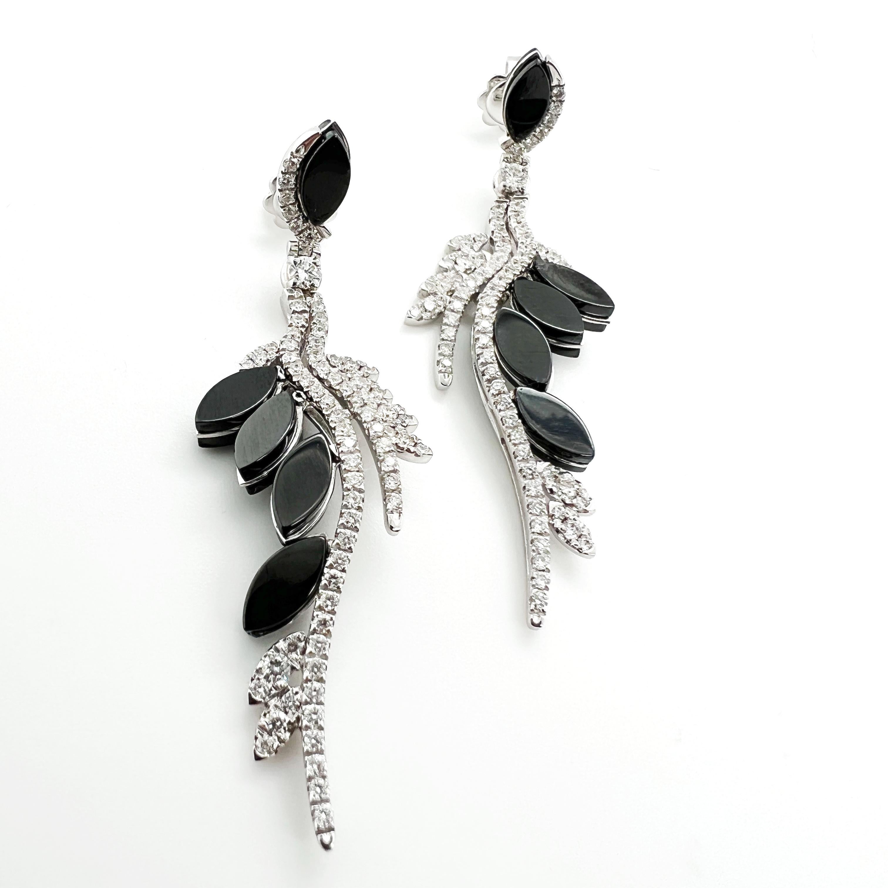 Step into the world of contemporary elegance with our 18kt White Gold Earrings adorned with diamonds and chic black ceramic. Crafted with precision and style, these earrings embody modern sophistication. The luminous 18kt white gold setting exudes