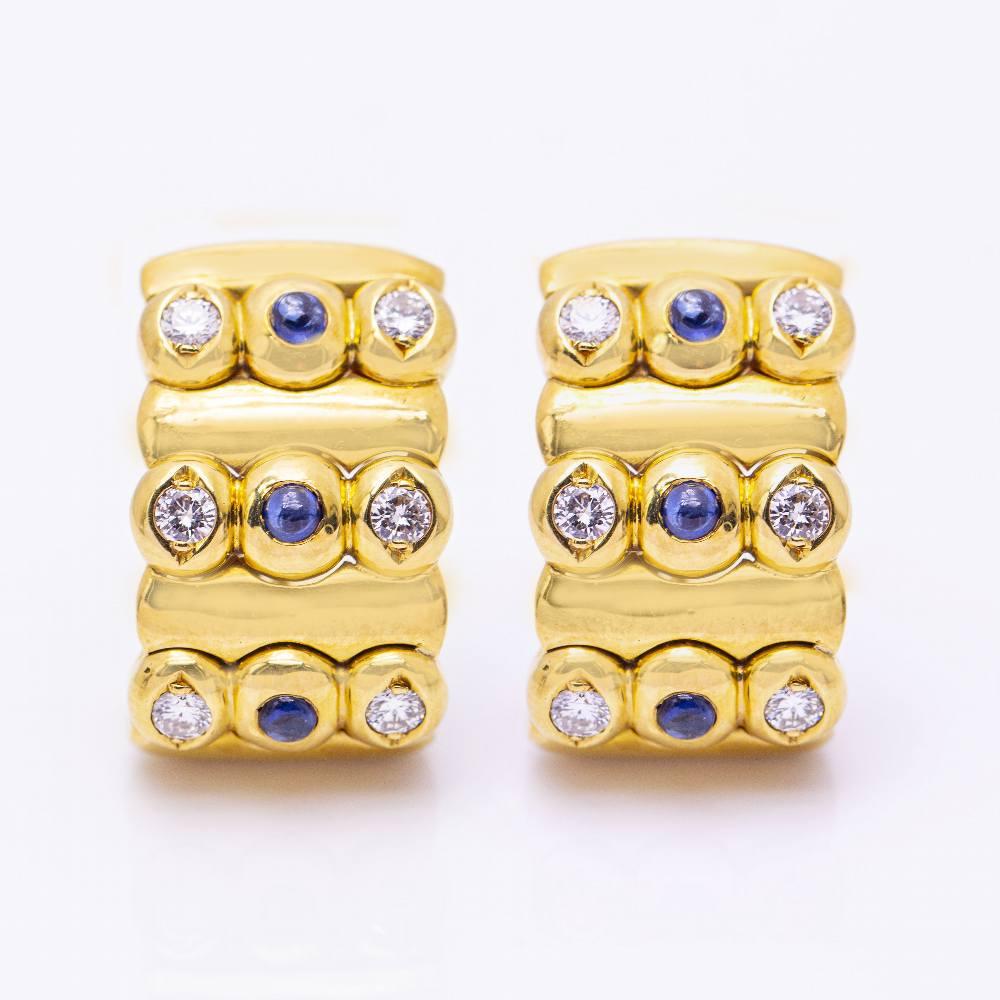 Earrings in Yellow Gold with Sapphires and Diamonds  Brilliant Cut Diamonds with a total weight of 0.45cts. in G/VS quality  Sapphire with a total weight of 0.18ct  18kt Yellow Gold  Omega Clasp  24.80 grams.  Width 4,0cm  Brand new product. Ref: