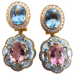 Orecchini in oro rosa con 2 tormaline rosa, 16 acquamarine e diamanti.