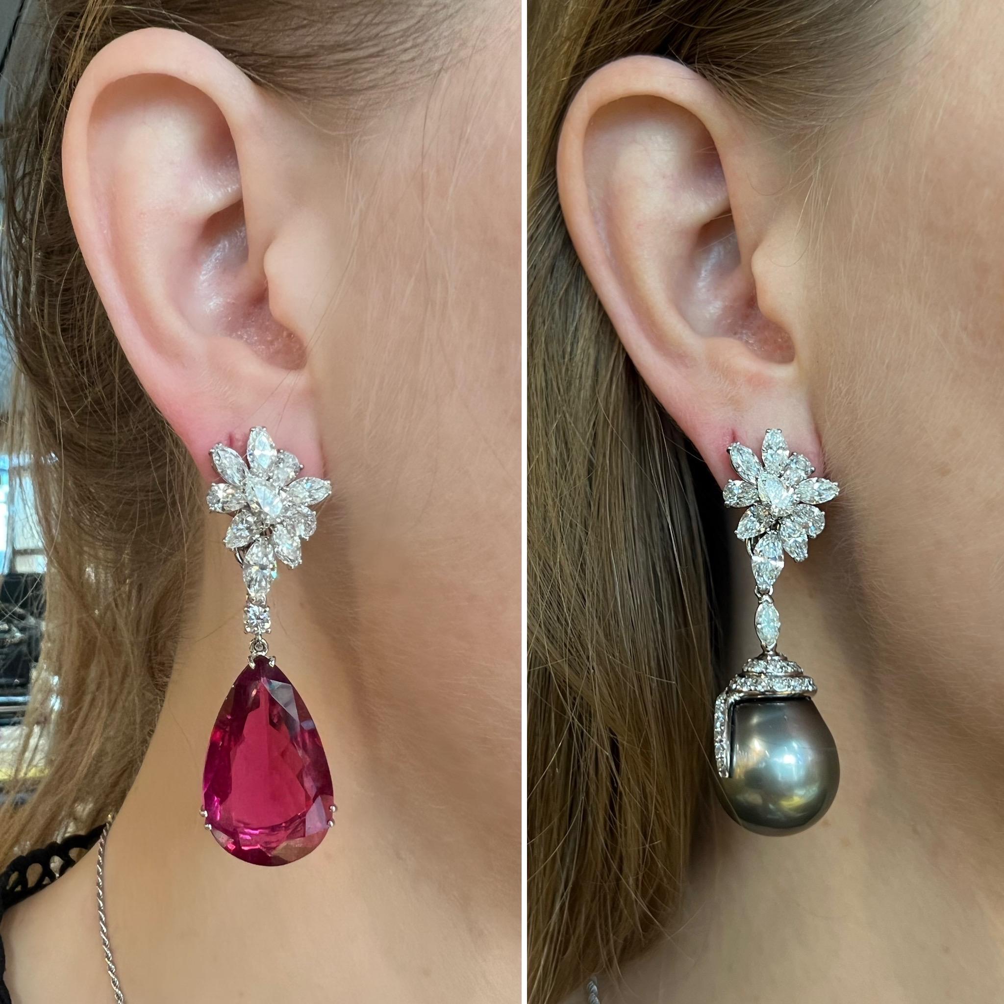 This beautiful pair of earrings can be wear in 7 possible combinations.
The upper part in white gold set with pear and marquise cut diamonds (approx. 6 carats) can stand alone.

The upper part has a system that will allow you to add at your