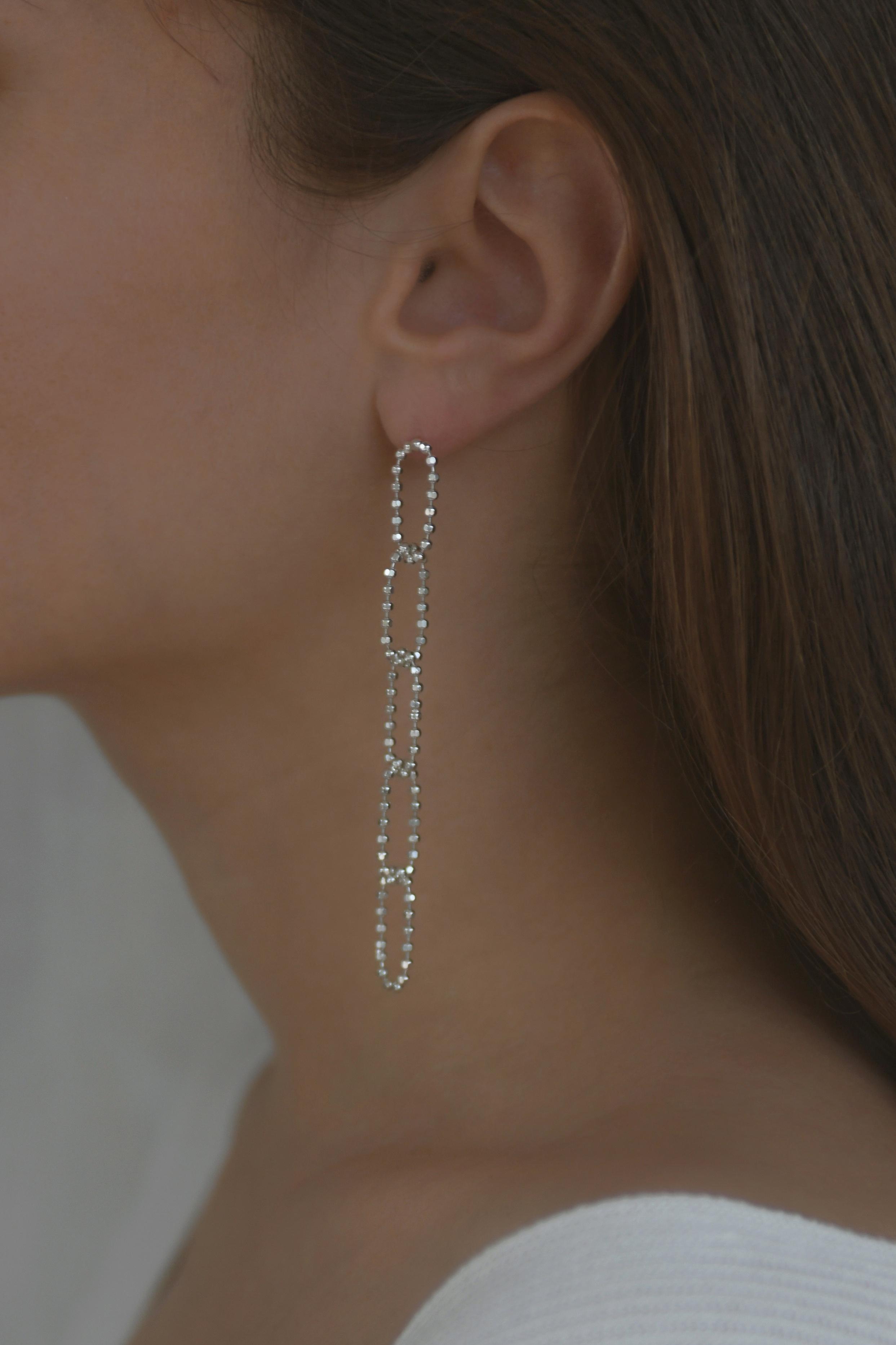Honeycomb long earrings 

Lightweight link earrings made of a delicate sterling silver beaded chain. The chain adds movement to the look and reflects light to make your face glow up. 

All of our earrings have 10 K posts to avoid allergies and