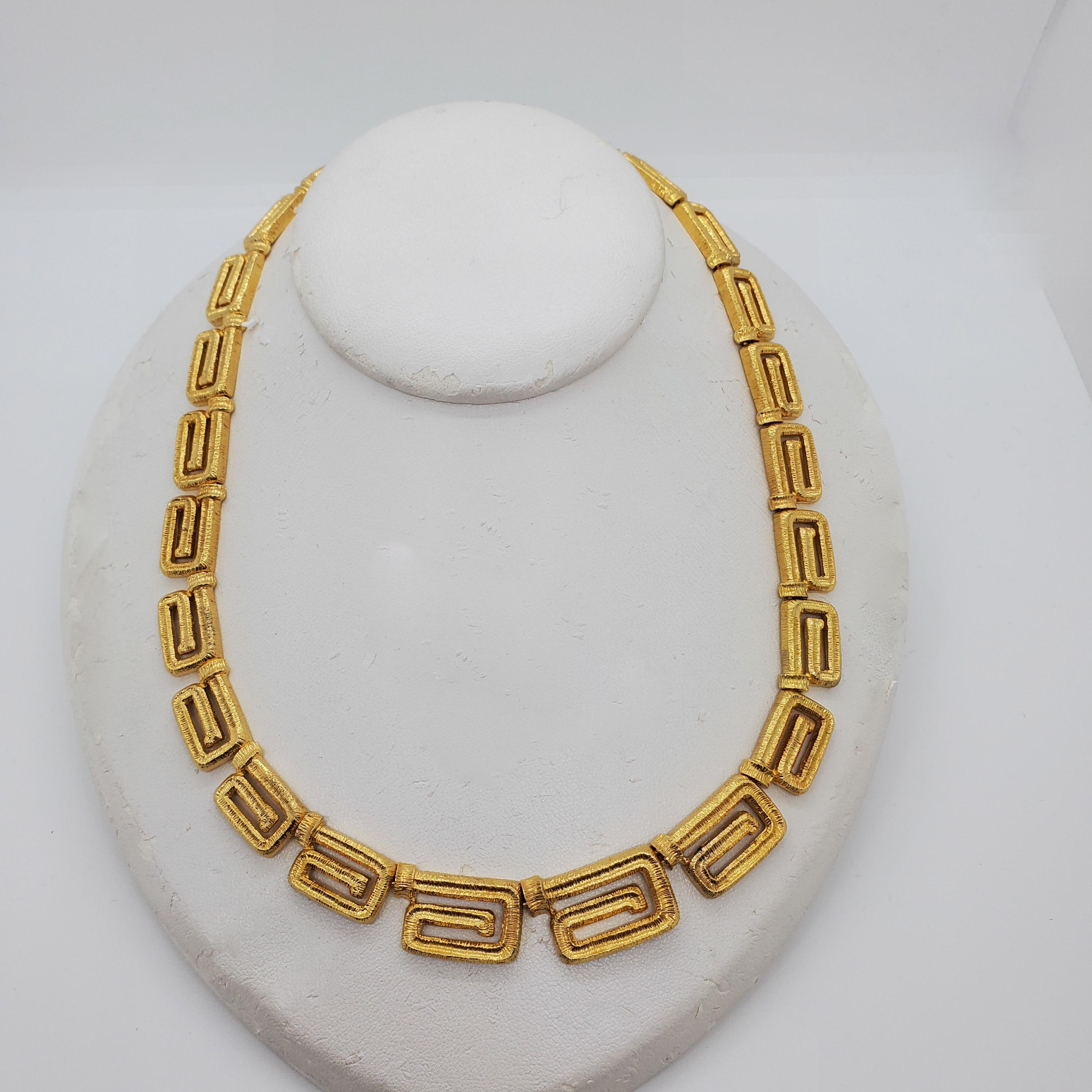 Beautiful set handmade in 18k yellow gold.  Necklace, earrings, and bracelet are all well made.  Necklace is 17