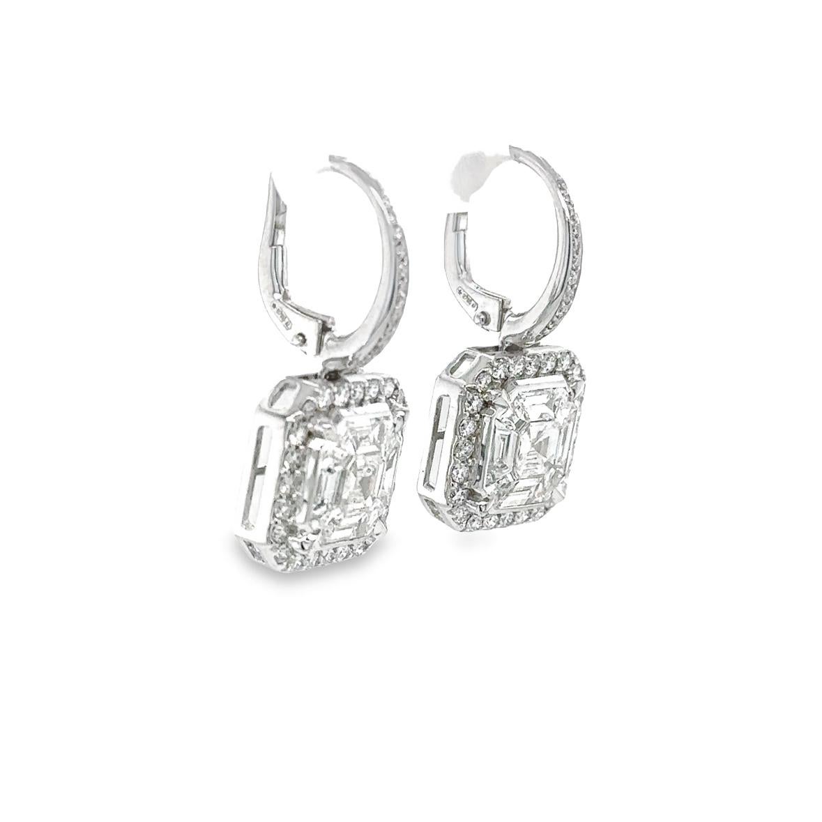 TIMELESS Earrings in white gold 18Kt 6.95 gr with Octagonal Diamonds G Color VS Clarity in total 1.72 ct and diamonds G color VS clarity in total 0.63 ct.

Timeless Collection inspired by elegance and its endless style. The sophistication and