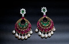 Earrings of emeralds, rubies and diamonds in 18 karat gold