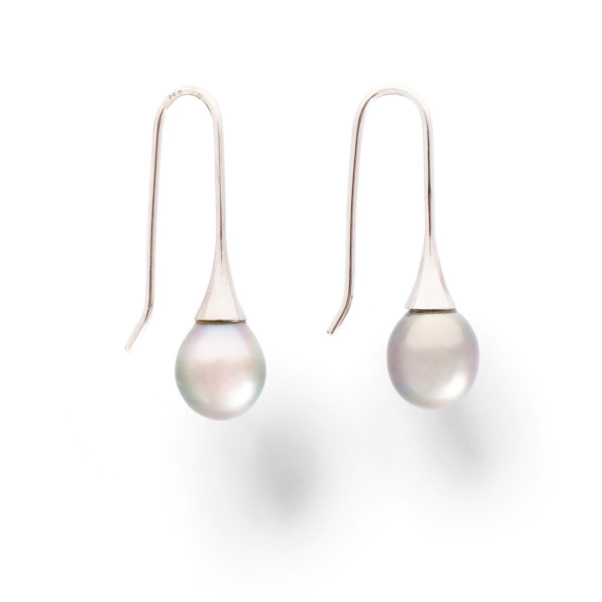 Earrings Pearl Drop White Gold.
Pearl height: Approximately 11.05 millimeters each.
Pearl width: Approximately 9.13 millimeters each.
Total length: 3.20 centimeters.
Gross weight: 4.59 grams.
