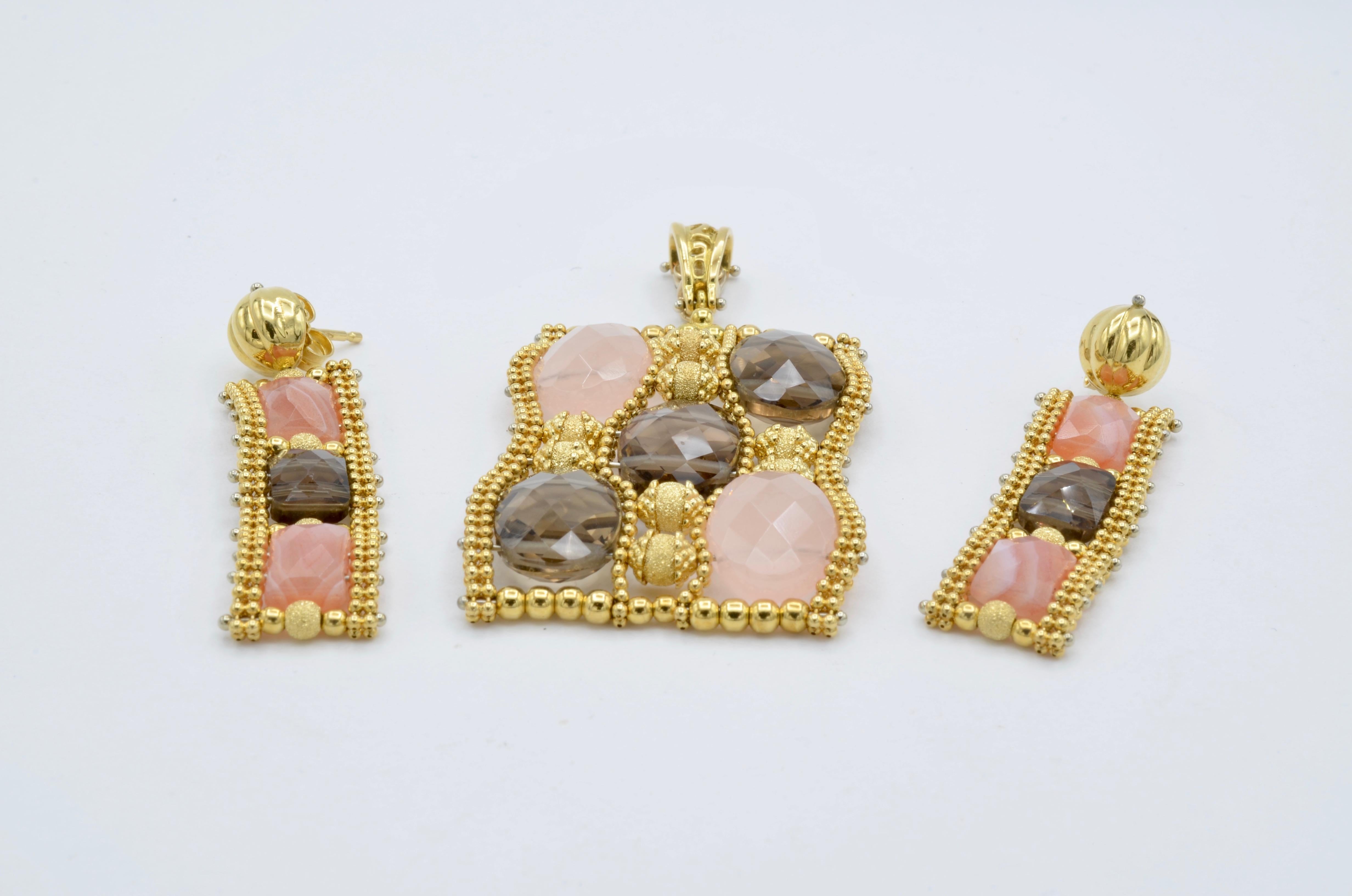 This color combination is neutral and fun. The pink beautifully gleams in the 14k gold setting of beaded texture. The pendant and earrings are flexible and have movement when you wear them.