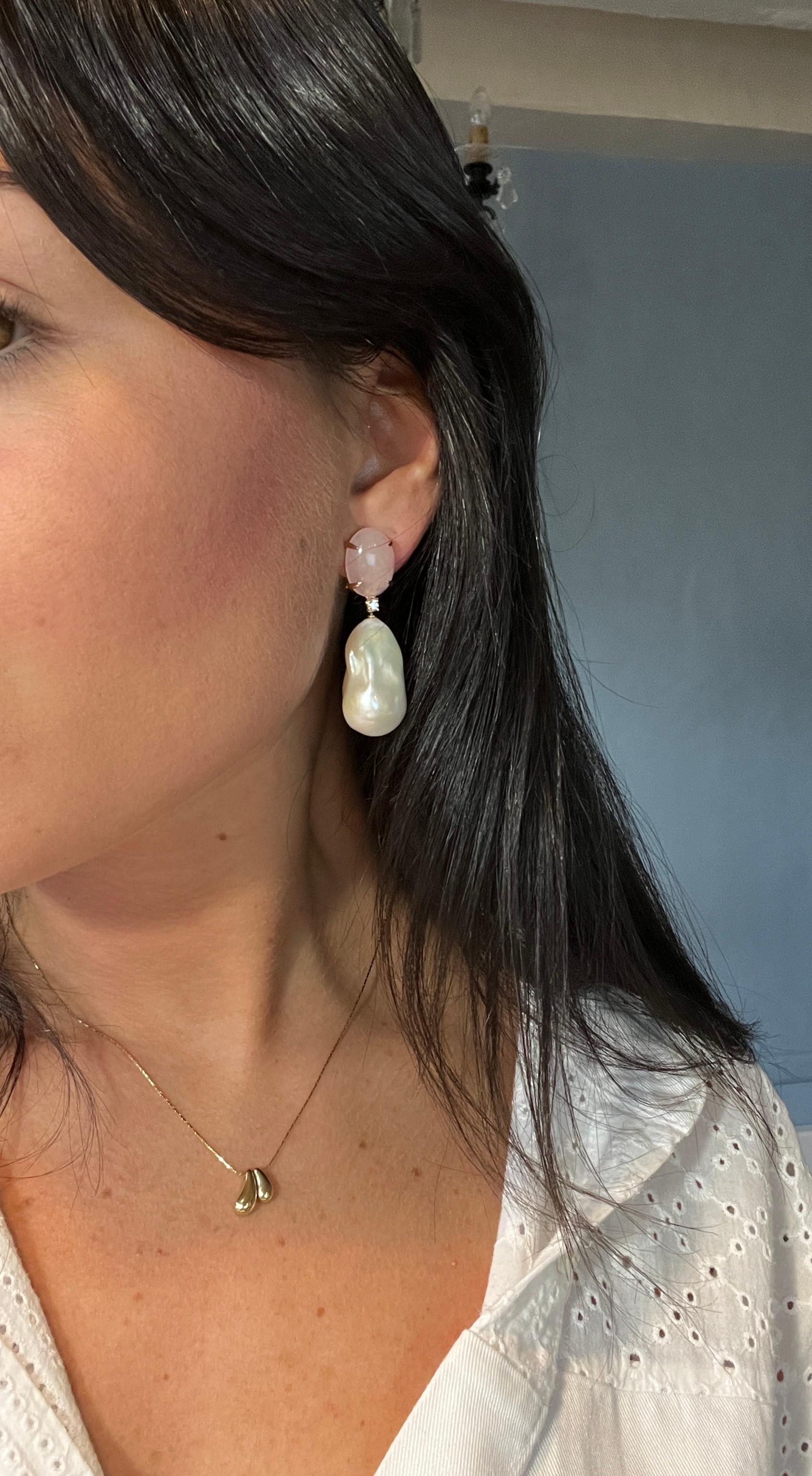 Earrings Quartz Pink Diamond Baroque Pearl. 
These pink quartz, diamond and baroque pearl earrings are both elegant and refined. This pair of earrings features cabochon-cut rose quartz mounted on an articulated 18-carat rose gold hanger. The baroque