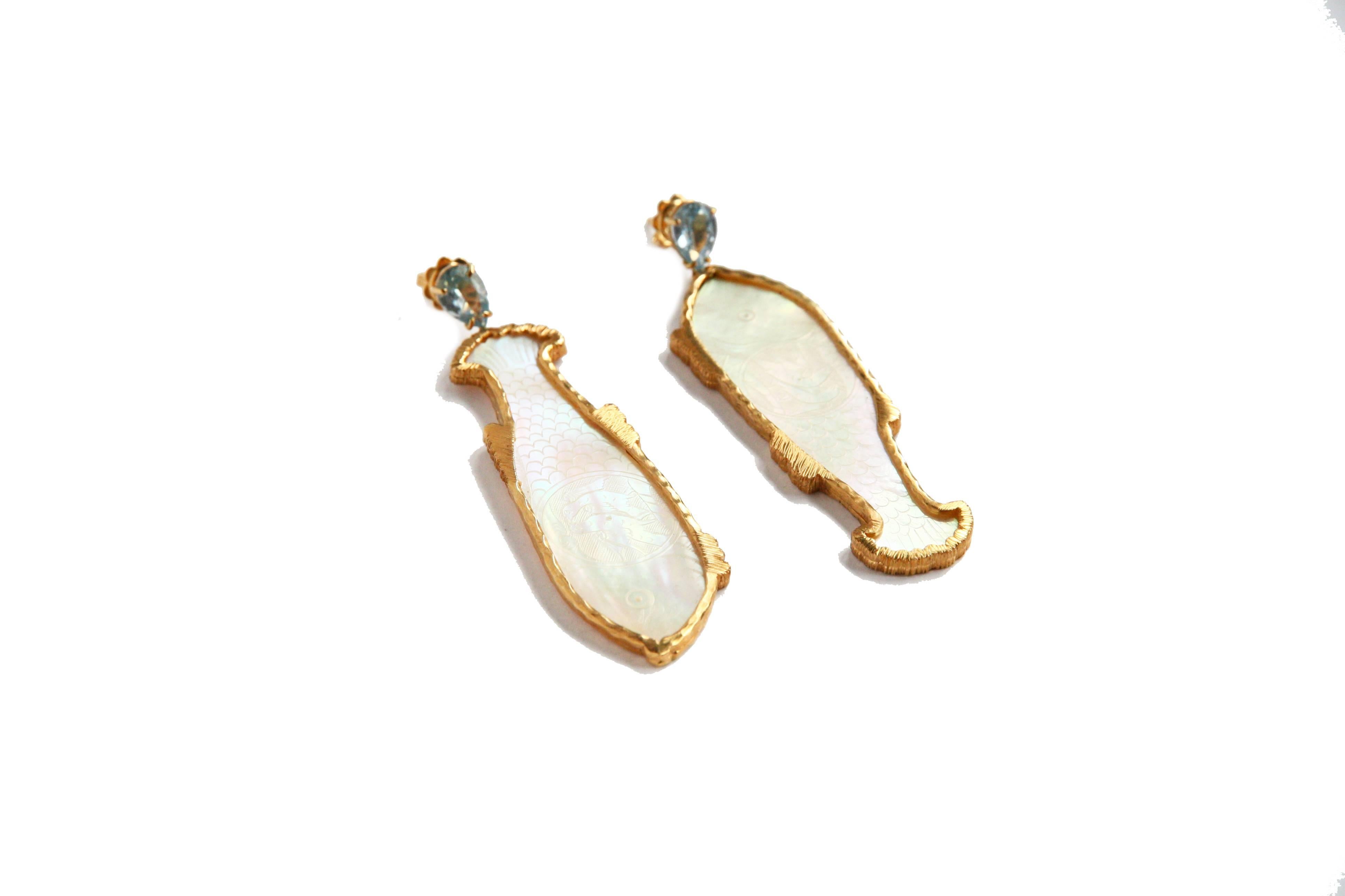 Earrings with antiques Macao casinò mother of pearls fiches fine engrave both side, faced sapphire drops, fine engrave 18k gold gr. 17,70, weight 9,5each.
Total length 7cm.
All Giulia Colussi jewelry is new and has never been previously owned or