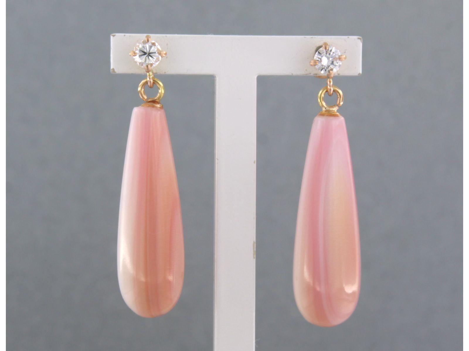 18k pink gold earrings set with agate and brilliant cut diamonds. 0.30ct - G/H - VS/SI

Detailed description:

the size of the earring is 3.3 cm long by 8.0 mm wide

weight 6.5 grams

occupied with

- 2 x 2.5 cm x 8.2 mm drop of cabachon cut
