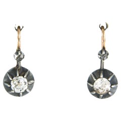 Earrings set with diamonds 14k pink gold and silver