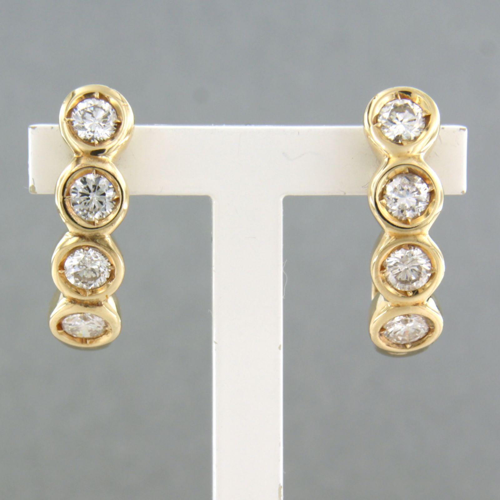 14k yellow gold earrings set with brilliant cut diamond 1.00ct - F/G - VS/SI

detailed description:

the size of the earrings is 2.0 cm high and 0.5 cm wide

Total weight 6.0 grams

set with

- 8 x 3.2 mm brilliant cut diamond, approximately 1.00