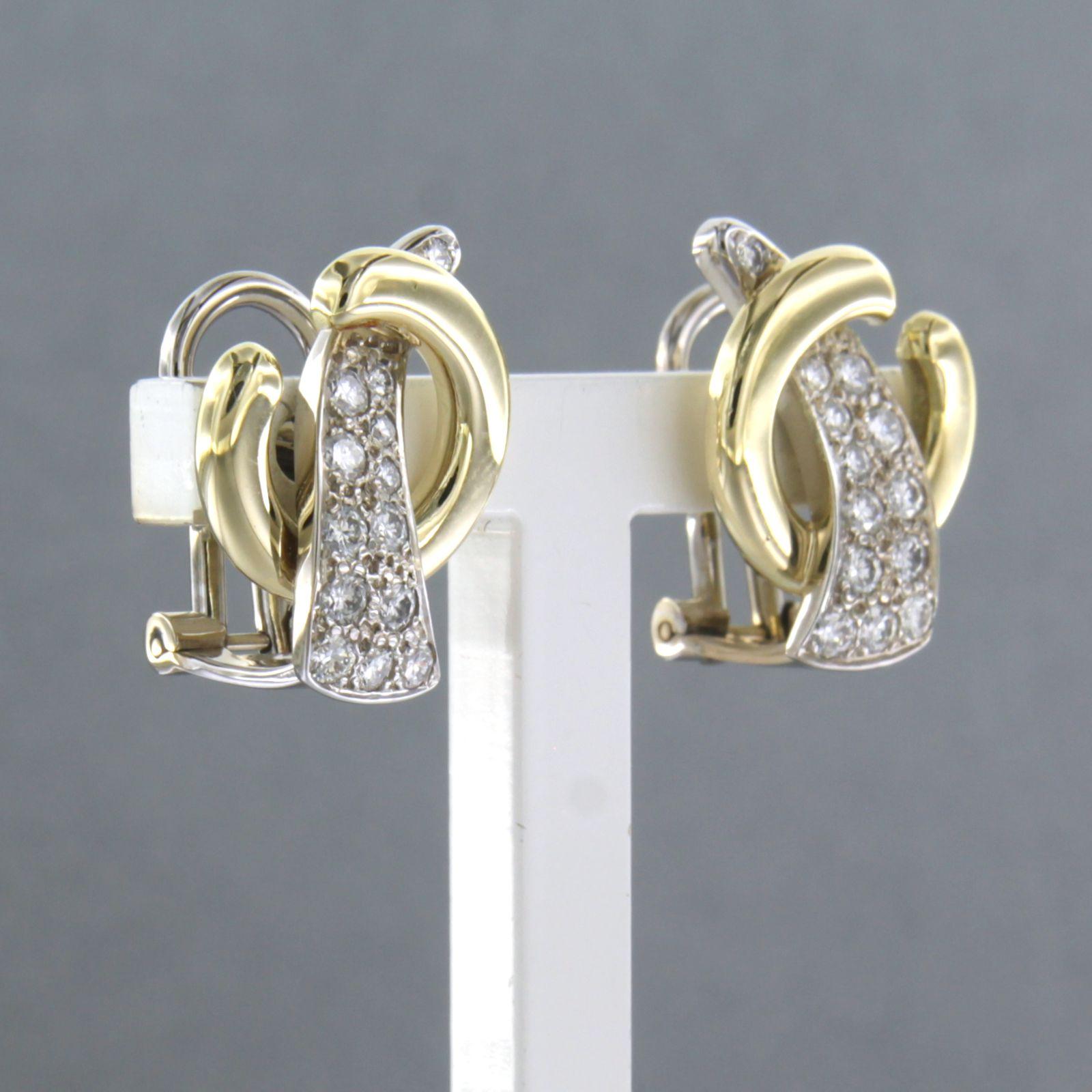 Modern Earrings set with diamonds 14kt bicolour gold For Sale
