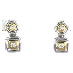 Earrings set with diamonds 18k bicolor gold