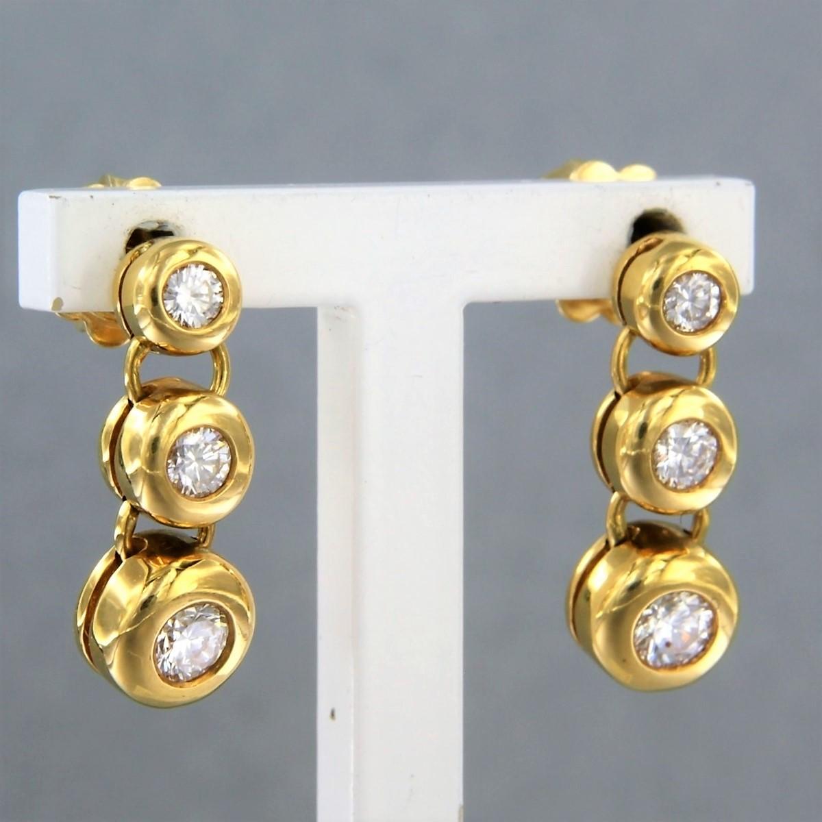 Modern Earrings set with diamonds in total 0.65ct 18k yellow gold For Sale