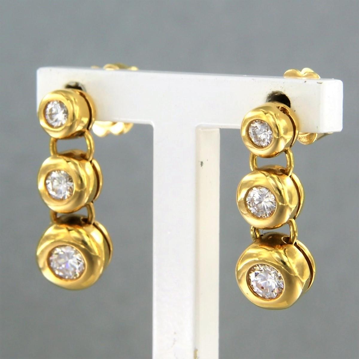 Brilliant Cut Earrings set with diamonds in total 0.65ct 18k yellow gold For Sale