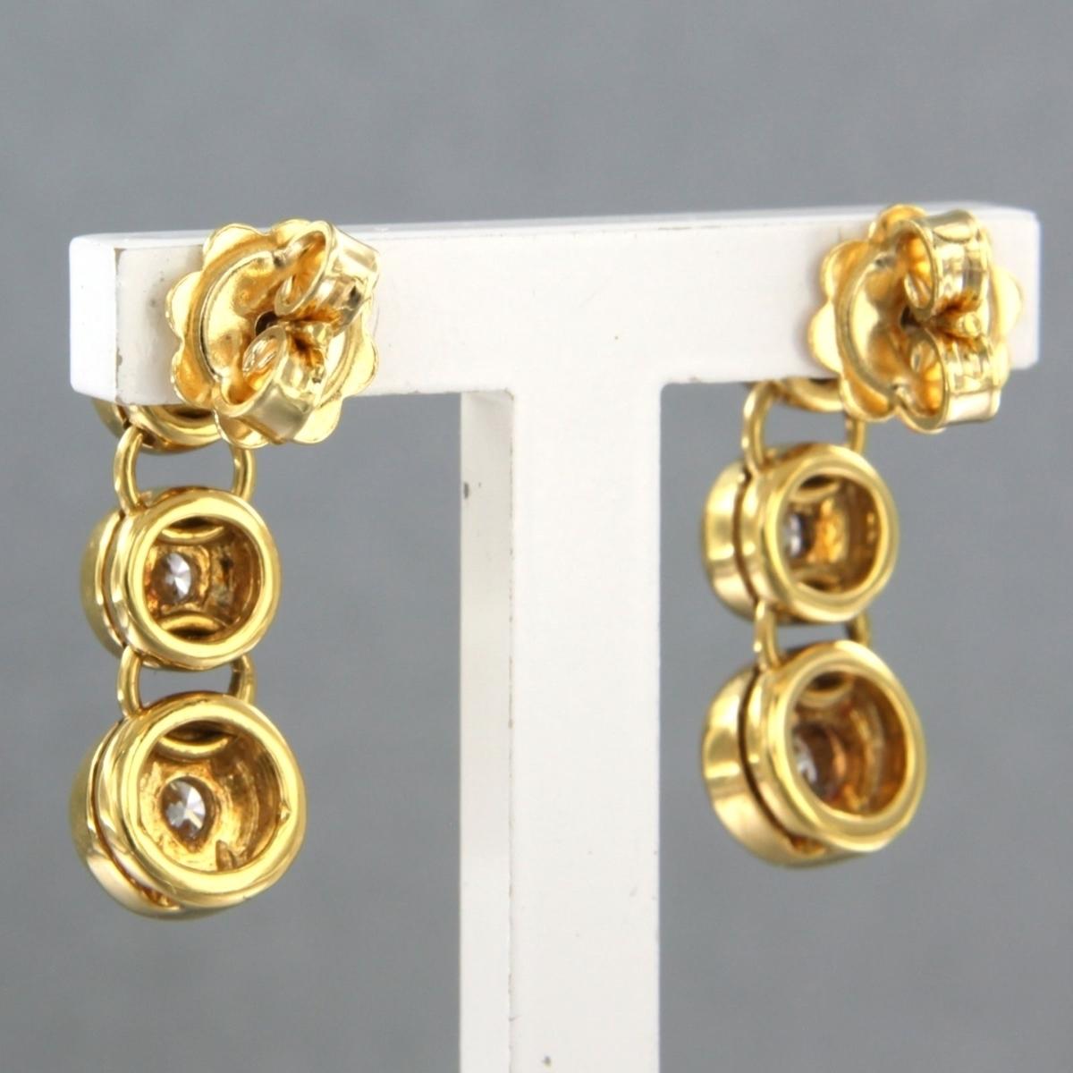 Earrings set with diamonds in total 0.65ct 18k yellow gold In Excellent Condition For Sale In The Hague, ZH