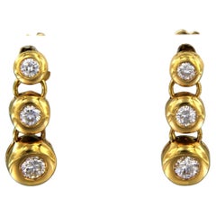 Ohrringe aus insgesamt 0,65 Karat 18 Karat Gelbgold mit Diamanten besetzt