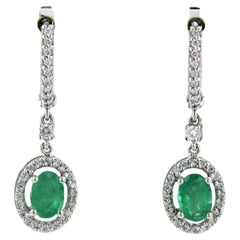 Earrings set with emerald and diamonds 14k white gold