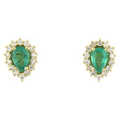 Ohrringe aus 18 Karat Gelbgold mit Smaragd und Diamanten besetzt