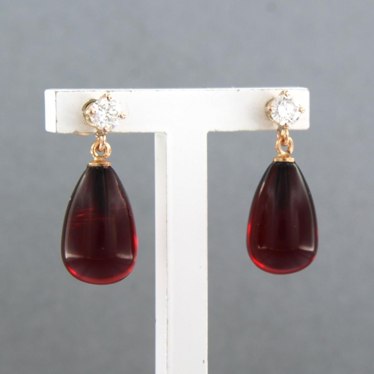 Modern Earrings set with garnet and diamonds 18k pink gold For Sale
