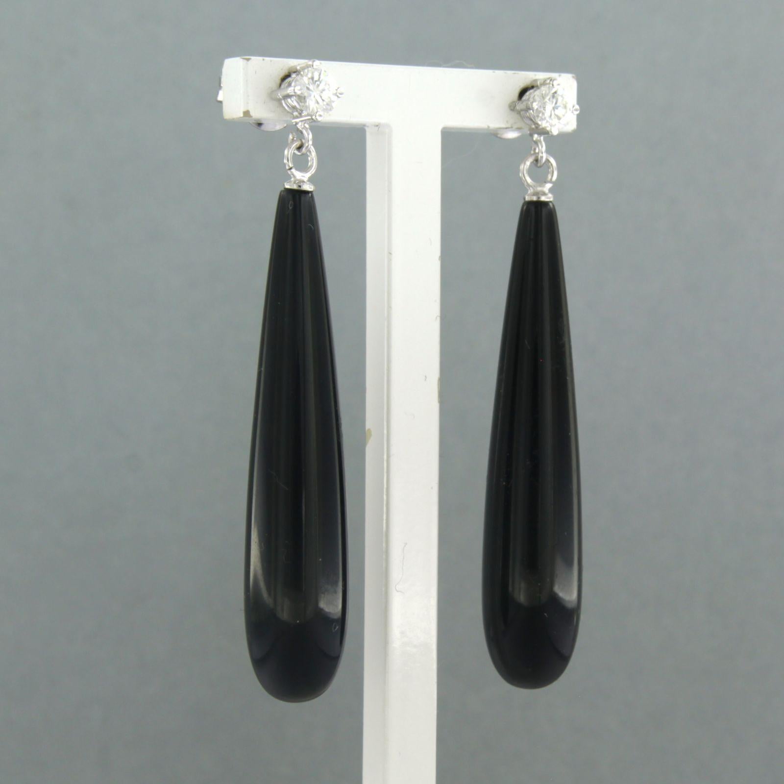 Modern Earrings set with onyx and diamonds 18k white gold For Sale