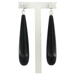 Boucles d'oreilles en or blanc 18 carats serties d'onyx et de diamants