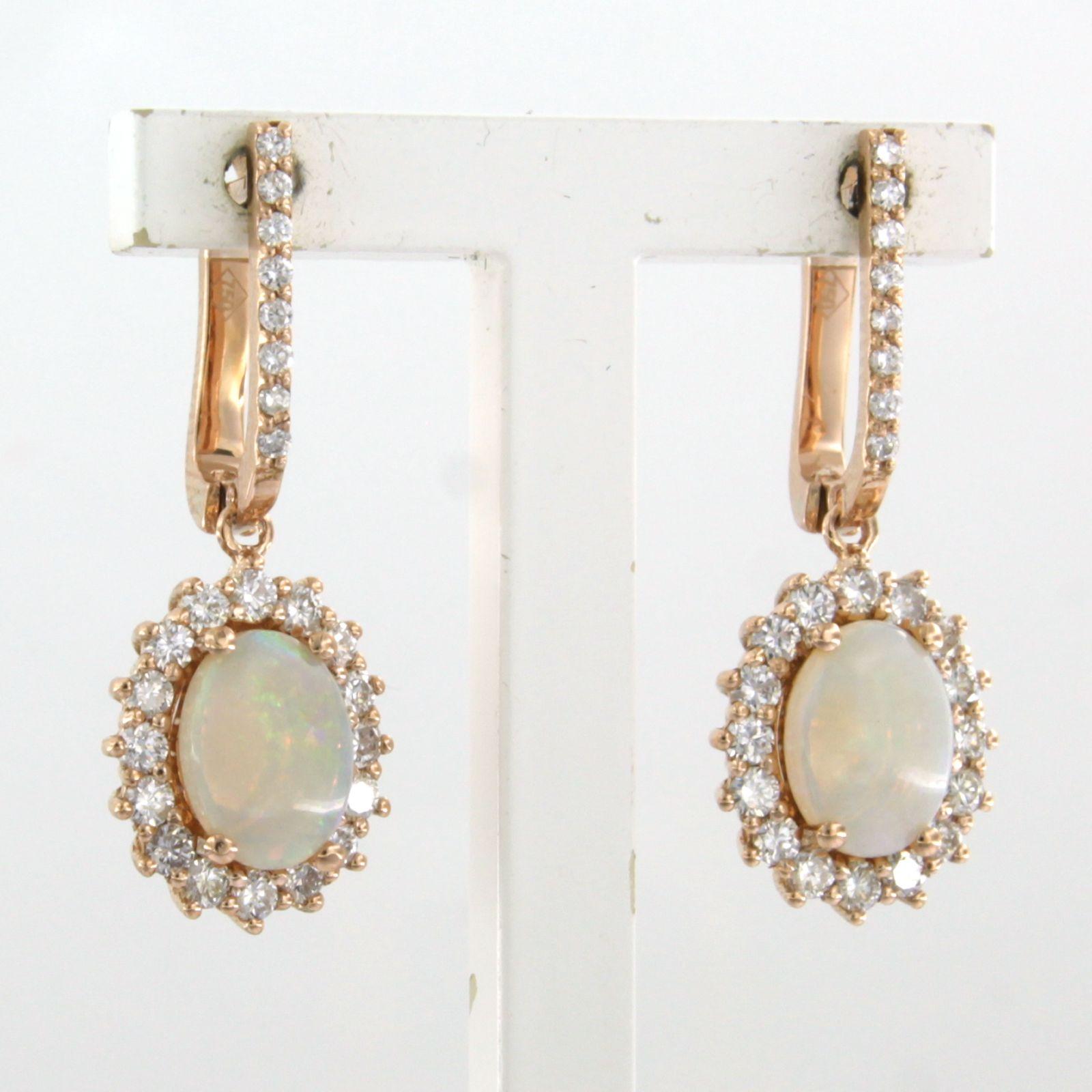 Modern Earrings set with opal and brilliant cut diamonds up to 0.75ct 18k pink gold For Sale