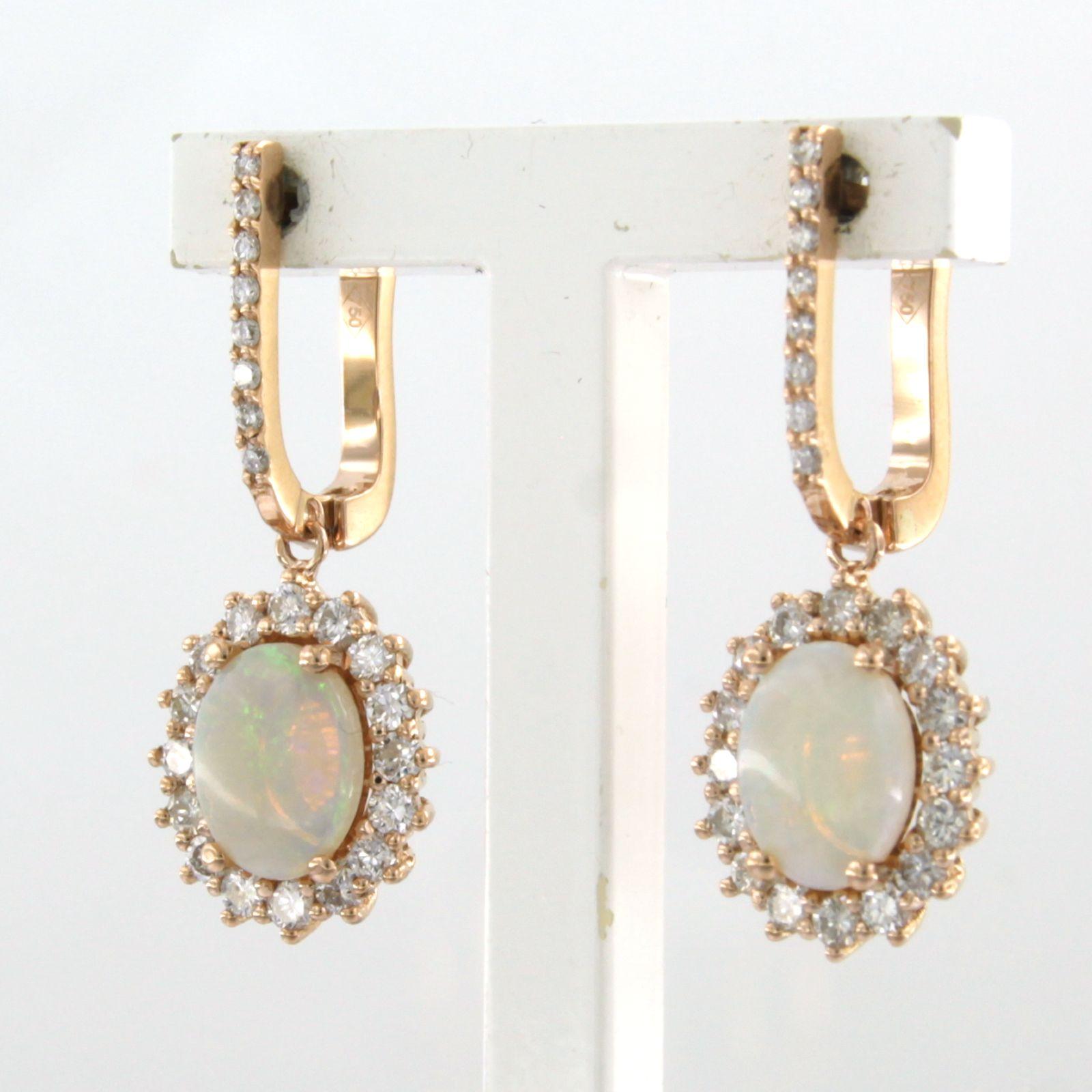 Brilliant Cut Earrings set with opal and brilliant cut diamonds up to 0.75ct 18k pink gold For Sale