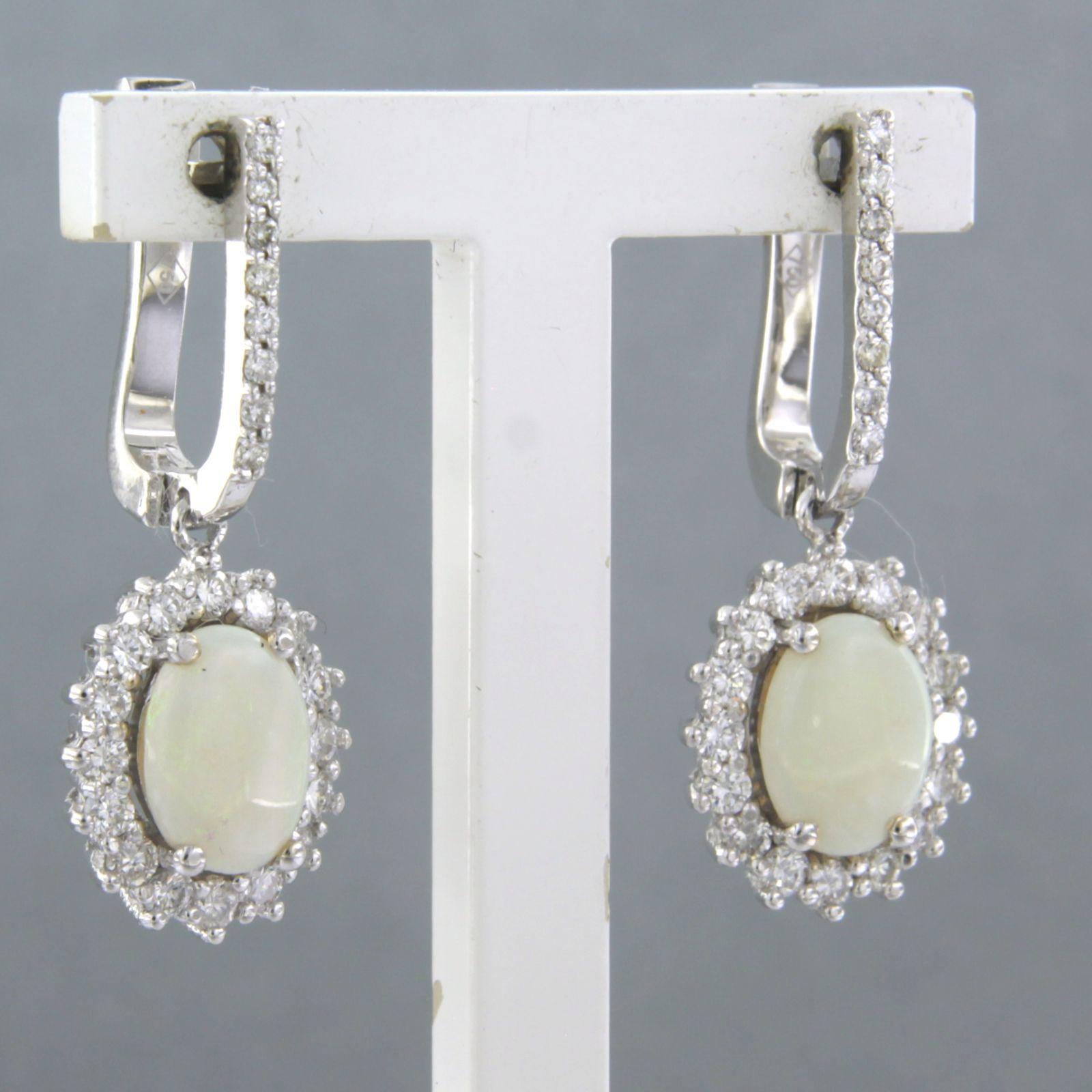 Modern Earrings set with opal and diamonds 18k white gold For Sale