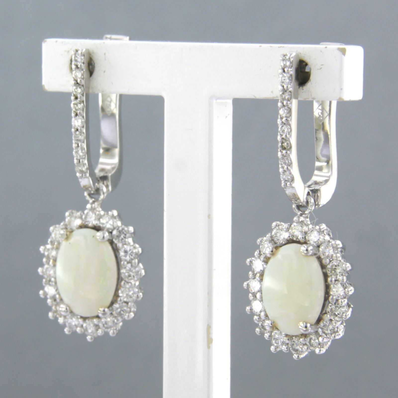 Brilliant Cut Earrings set with opal and diamonds 18k white gold For Sale