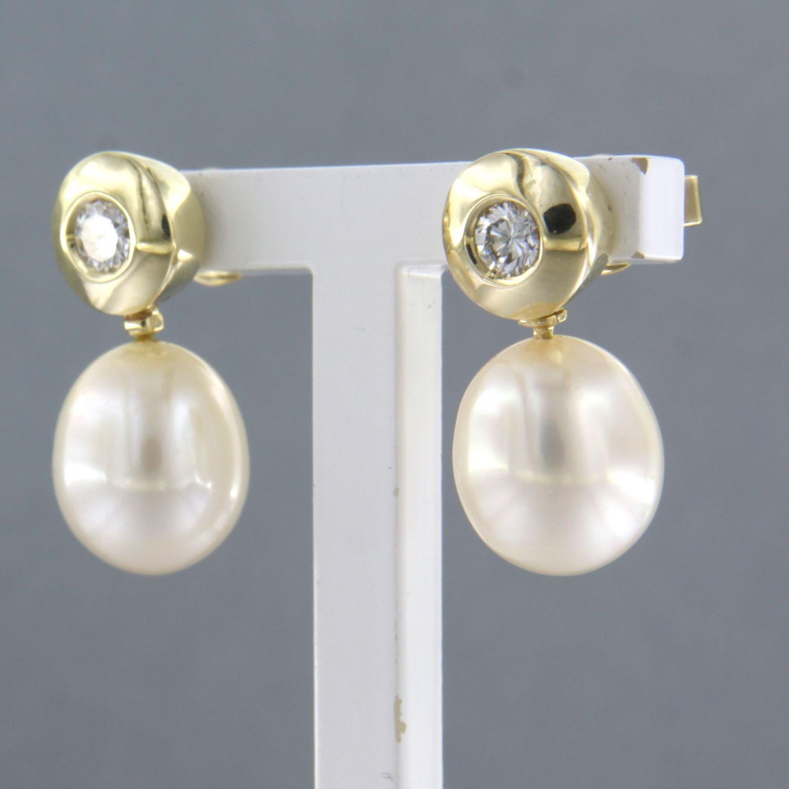 Modern Earrings set with pearl and brilliant cut diamond up to 0.30ct. 14k yellow gold For Sale