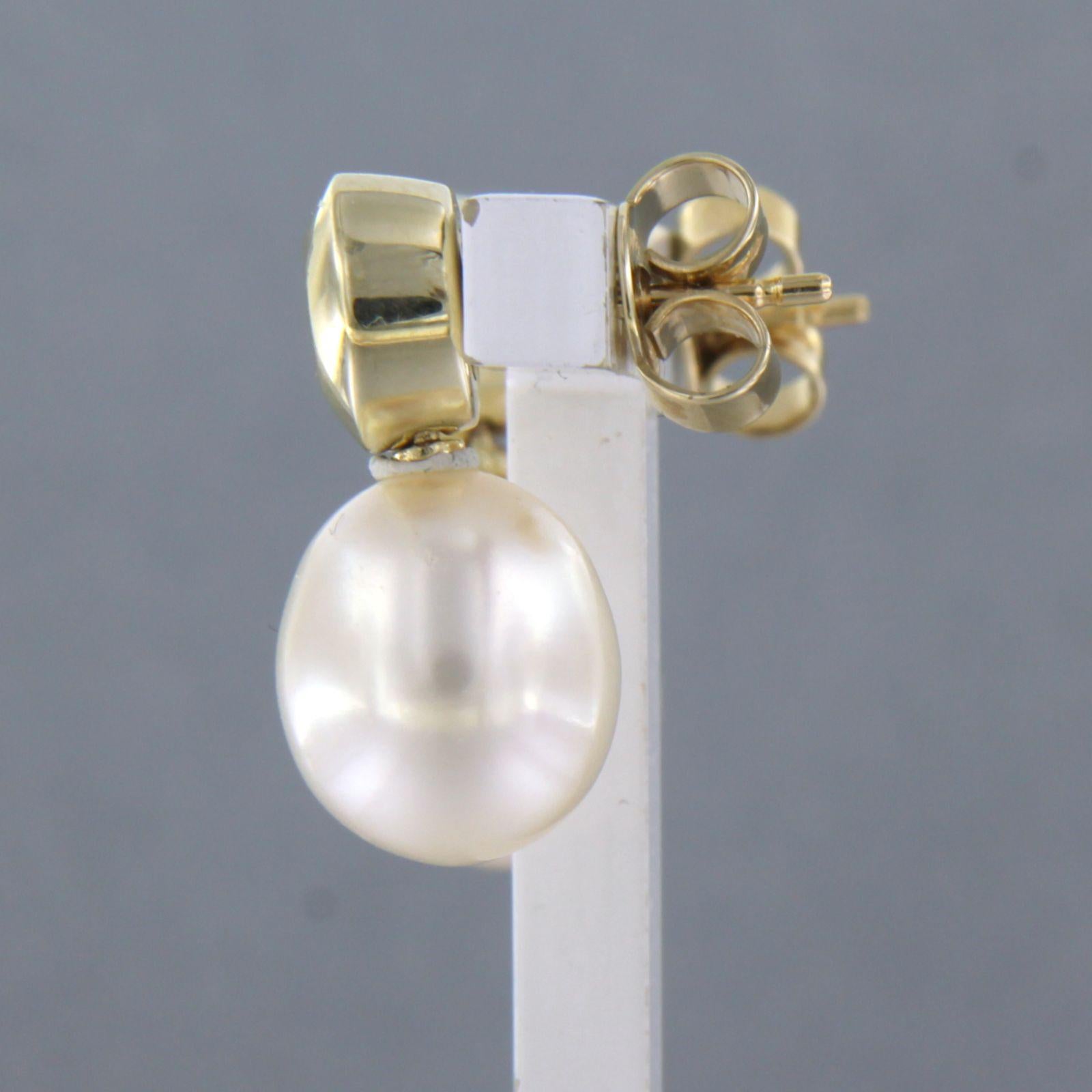 Brilliant Cut Earrings set with pearl and brilliant cut diamond up to 0.30ct. 14k yellow gold For Sale