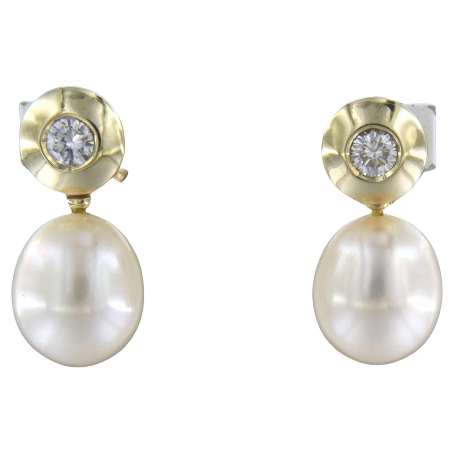Earrings set with pearl and brilliant cut diamond up to 0.30ct. 14k yellow gold For Sale