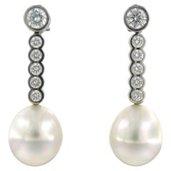 Earrings set with pearl and brilliant cut diamonds up to 1.20ct 18k white gold