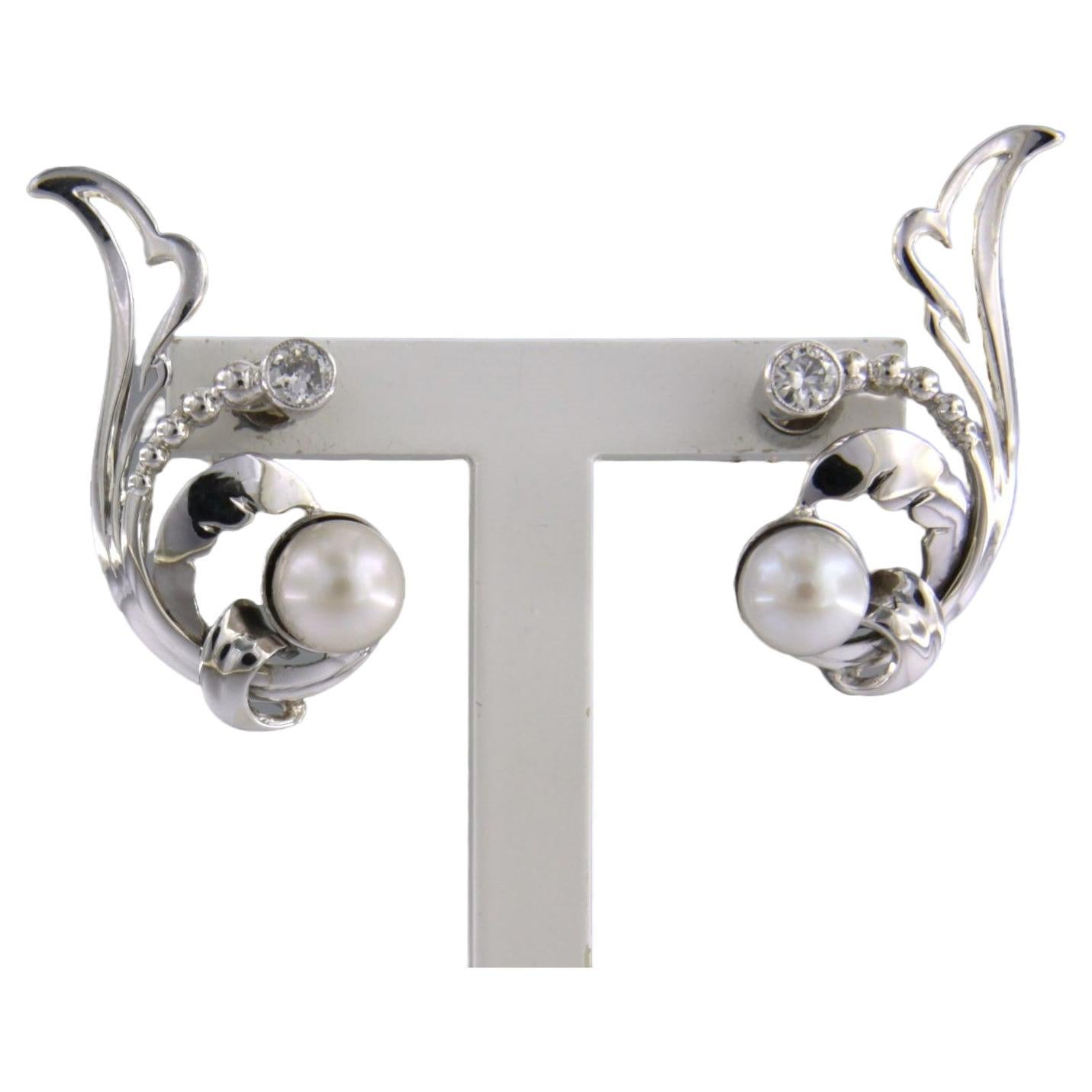 Earrings set with pearl and diamonds 14k white gold