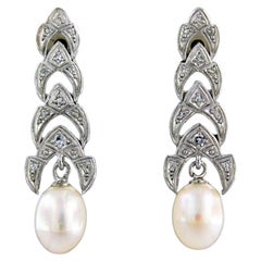 Antique Earrings set with pearl and diamonds 18k white gold and platinum