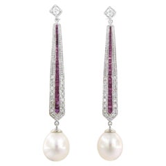 Earrings set with pearl, ruby and diamonds 14k white gold