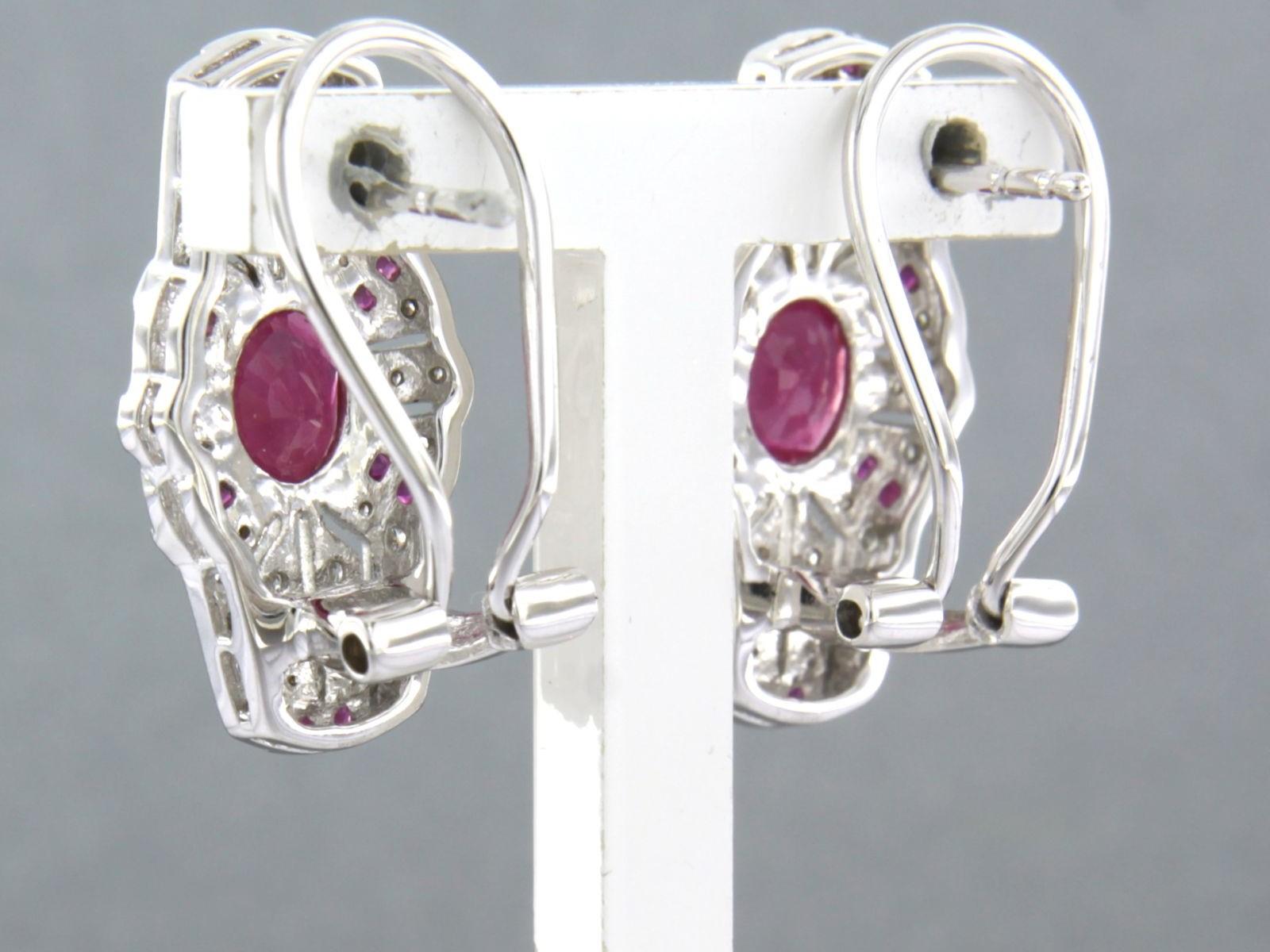 Brilliant Cut Earrings set with ruby and diamonds 14k white gold For Sale