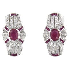 Earrings set with ruby and diamonds 14k white gold