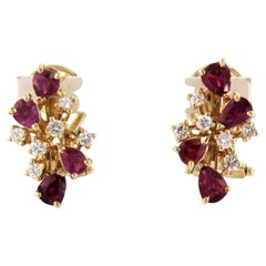 Earrings set with ruby and diamonds 14k yellow gold